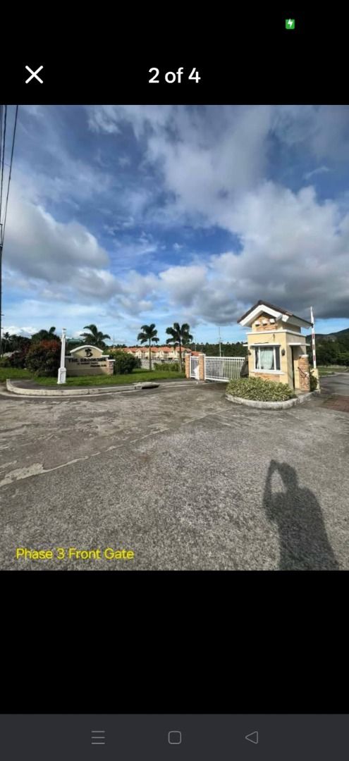 Summit Point Phase 3E (Category: Lot) located in Marikina City. Submitted by noelleg88 (Listing ID 1469455046, Image 3). Description: - Location: Phase 3E, Summit Point Brookside - Property Type: Vacant residential lot, ready for construction or investment - Views: Clear skies, surrounding greenery, and distant mountains - Accessibility: Paved concrete road directly in front of the property - Security: Located inside a secure, gated community - I