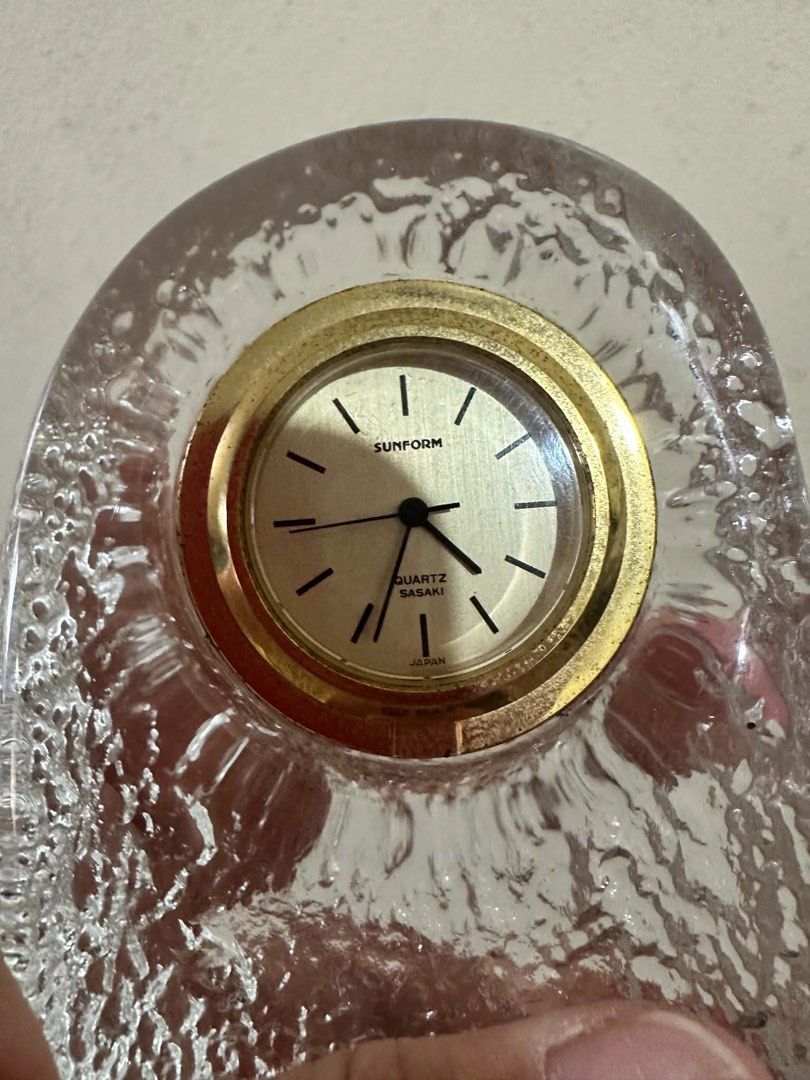 Sunform Quartz Sasaki Crystal Table Clock Japan (Category: Clocks) located in Caloocan City. Submitted by prelovebyoreo (Listing ID 1469397937, Image 2). Description: Need Battery - Authentic Japanese crystal desk clock by Sunform & Sasaki Crystal - Heavy, thick ice-like textured glass block design - Elegant gold-tone bezel with champagne dial and black baton markers - Reliable battery-operated quartz movement - Stands upright on any flat surface