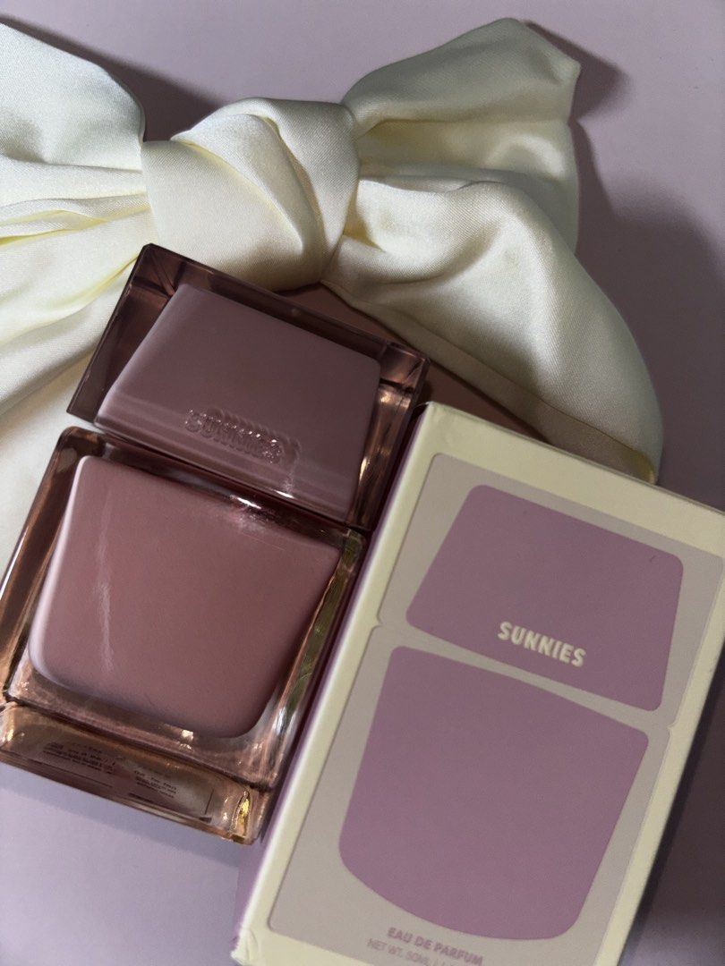 Sunnies Eau De Parfum 50ml (Category: Fragrance & Deodorants) located in Baguio. Submitted by heranna_preloved (Listing ID 1469443663, Image 1). Description: Sunnies (Pink) Eau De Parfum 50ml - sprayed once to smell lang - Comes with original box RFS: doesn’t like the smell that much selling low because it was a gift to me slightly nego.