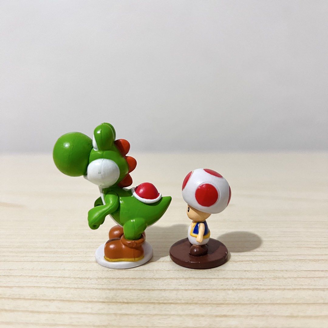 Super Mario Yoshi and Toad Mini Figures height: 3-4.5cm - Php 100 each NOTE: w/ small paint chips (Category: Character Goods) located in Davao. Submitted by pandorastoybox (Listing ID 1469495314, Image 2). Description: Super Mario Yoshi and Toad Mini Figures height: 3-4.5cm - Php 100 each NOTE: w/ small paint chips.