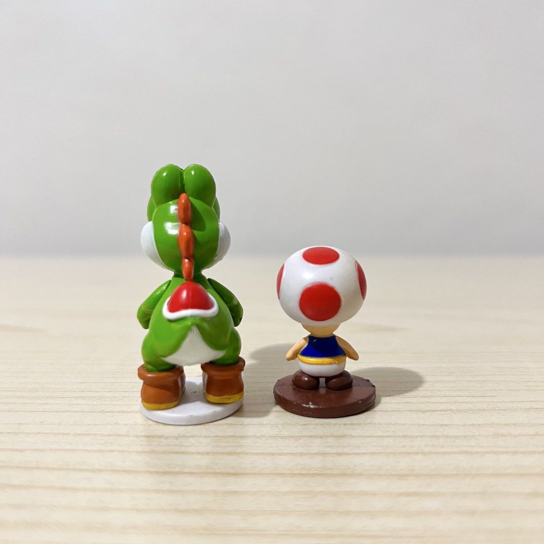 Super Mario Yoshi and Toad Mini Figures height: 3-4.5cm - Php 100 each NOTE: w/ small paint chips (Category: Character Goods) located in Davao. Submitted by pandorastoybox (Listing ID 1469495314, Image 3). Description: Super Mario Yoshi and Toad Mini Figures height: 3-4.5cm - Php 100 each NOTE: w/ small paint chips.