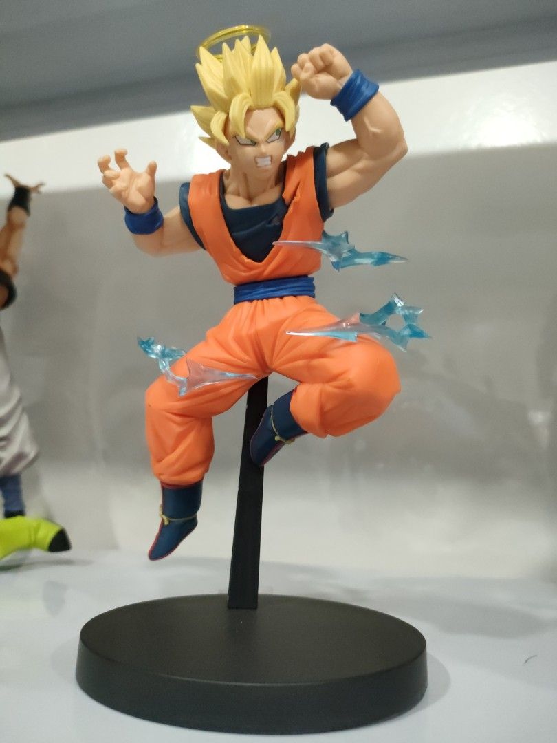 Super Saiyan 2 Son Goku (Category: Figurines & Statues) located in Bulacan. Submitted by hunterherojapanjdm (Listing ID 1469475399, Image 1). Description: Banpresto Dragon Ball Z Match Makers Super Saiyan 2 Son Goku (vs. Majin Vegeta) figure. It stands approximately 15 cm tall and features Goku with his signature halo and dynamic blue energy effect parts..