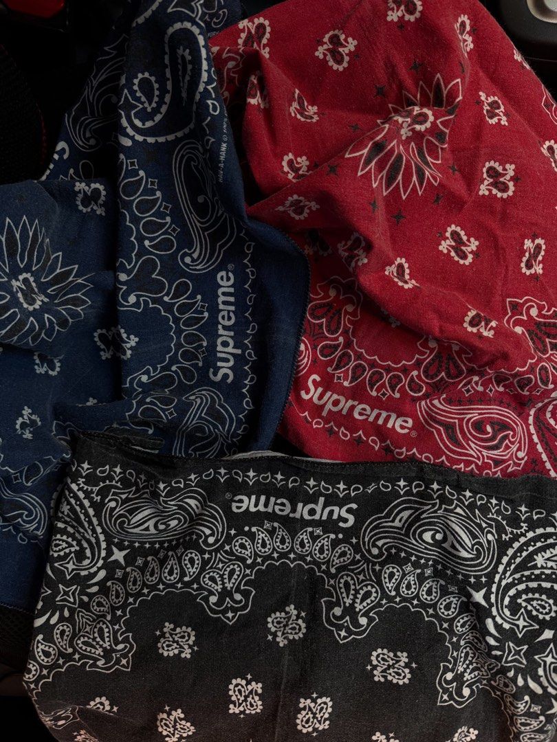 Supreme Bandana Set Red Blue Black (Category: Handkerchief & Pocket Squares) located in Manila. Submitted by sleamdaily222 (Listing ID 1469458150, Image 2). Description: - Set of 3 Supreme bandanas in Red, Navy Blue, and Black - Classic paisley print featuring the iconic box logo - Made with standard cotton material - Versatile streetwear accessories for neck wear or headbands - Bundle deal, selling all three together.