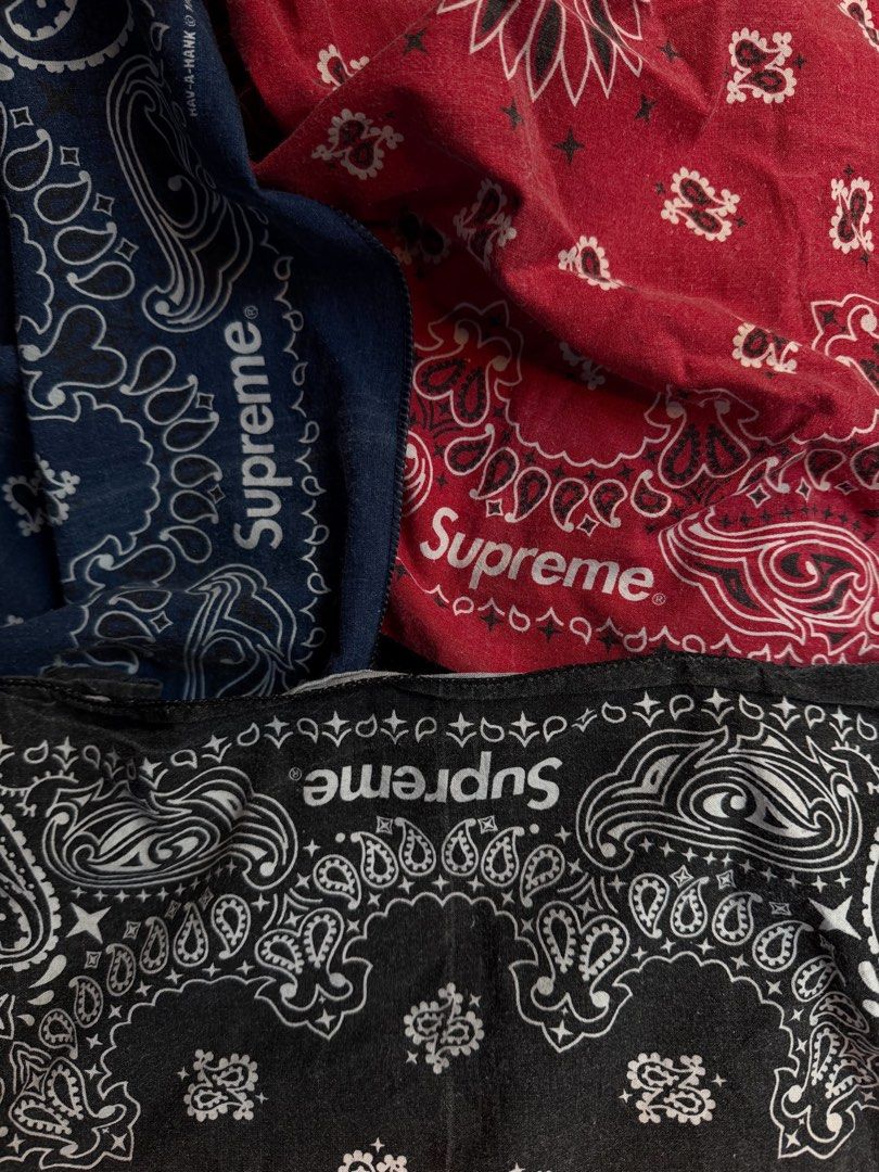 Supreme Bandana Set Red Blue Black (Category: Handkerchief & Pocket Squares) located in Manila. Submitted by sleamdaily222 (Listing ID 1469458150, Image 3). Description: - Set of 3 Supreme bandanas in Red, Navy Blue, and Black - Classic paisley print featuring the iconic box logo - Made with standard cotton material - Versatile streetwear accessories for neck wear or headbands - Bundle deal, selling all three together.