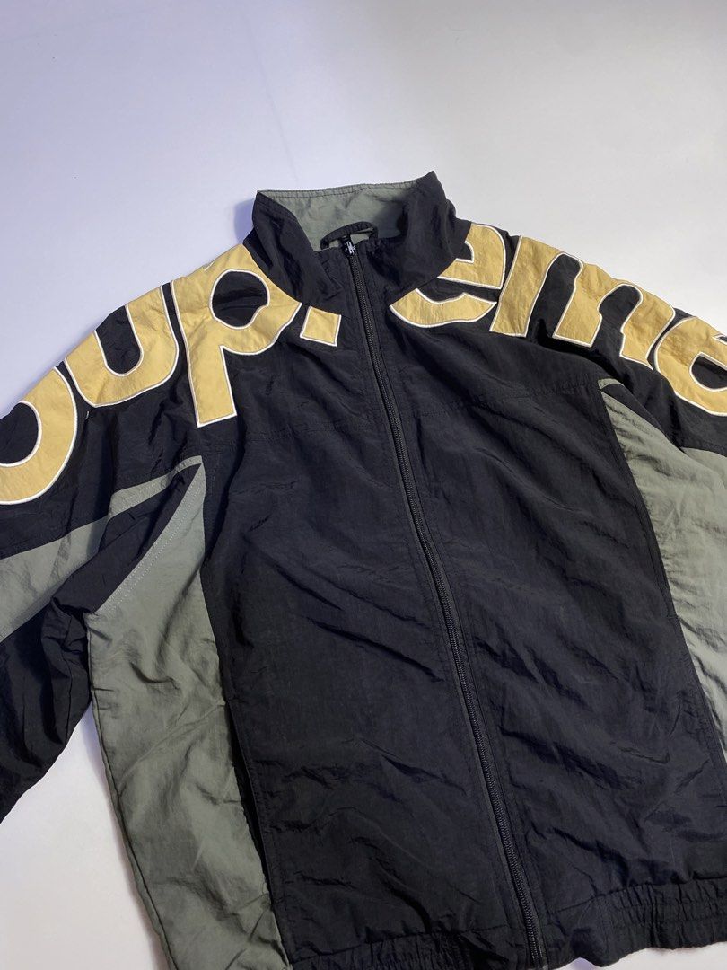 Supreme Shoulder Logo track jacket (Category: Coats, Jackets and Outerwear) located in Manila. Submitted by streetw1se.ph (Listing ID 1469505021, Image 2). Description: Supreme shoulder logo Width:23 Length:25 Shoulder:22 Sleeve length:18 Hem:19 (Measured in inches) -Issue in zipper (fading) -Good condition overall .