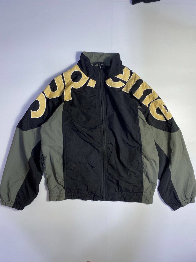 Supreme Shoulder Logo track jacket (Category: Coats, Jackets and Outerwear) located in Manila. Submitted by streetw1se.ph (Listing ID 1469505021, Image 1). Description: Supreme shoulder logo Width:23 Length:25 Shoulder:22 Sleeve length:18 Hem:19 (Measured in inches) -Issue in zipper (fading) -Good condition overall .