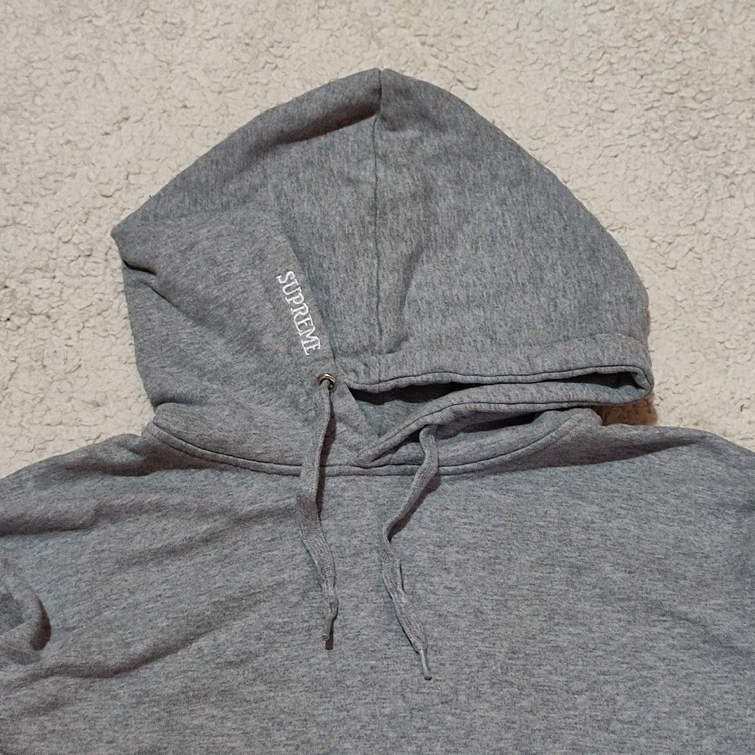 Supreme x Champion Grey Hoodie (Category: Hoodies) located in Manila. Submitted by anthonig (Listing ID 1469457663, Image 2). Description: Length: 23 inches Width: 19 inches Price: 400 pesos Condition: 9/10 Issues: 5th photo PM if interested or for inquiries Meetups within MANILA only Can do shipping at buyers expense.