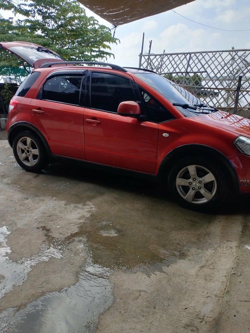 Suzuki SX4 1.6 4-Dr Auto (Category: Used Cars) located in Bulacan. Submitted by michaelang34319 (Listing ID 1469526316, Image 2). Description: FOR SALE: 2012 Suzuki SX4 Crossover G 🚗 📍 Suzuki SX4 Crossover G | 2012 Model Color: Orange / Red Transmission: Automatic Fuel Type: Gasoline Body Type: Hatchback / Crossover Seating Capacity: 5 Registration: With OR/CR Plate Number: Available upon serious inquiry ✨ Features & Highlights: Sporty crossove