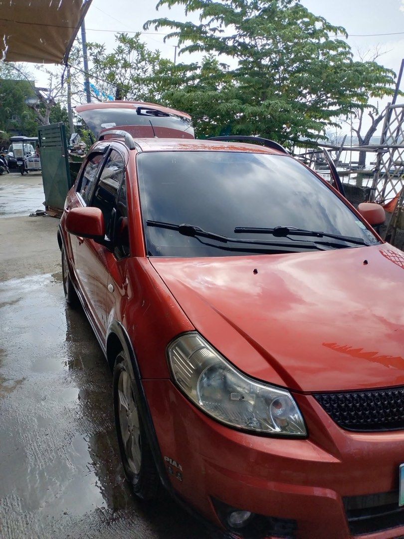 Suzuki SX4 1.6 4-Dr Auto (Category: Used Cars) located in Bulacan. Submitted by michaelang34319 (Listing ID 1469526316, Image 1). Description: FOR SALE: 2012 Suzuki SX4 Crossover G 🚗 📍 Suzuki SX4 Crossover G | 2012 Model Color: Orange / Red Transmission: Automatic Fuel Type: Gasoline Body Type: Hatchback / Crossover Seating Capacity: 5 Registration: With OR/CR Plate Number: Available upon serious inquiry ✨ Features & Highlights: Sporty crossove