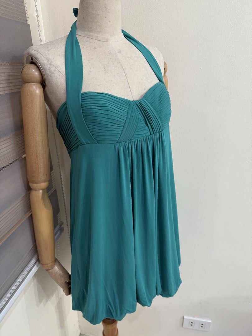 Teal Halter Neck Bubble Mini Dress (Category: Dresses) located in Antipolo. Submitted by jackiestash2 (Listing ID 1469566962, Image 3). Description: Vibrant teal mini dress with a halter neck tie. Sweetheart neckline features gathered pleats. Empire waist flows into a bubble hem skirt shape. Shirred elastic back panel for an easy fit. Soft, lightweight fabric with movement. Great pick for parties, dates, or nights out. Antipolo Gcash/Bdo Lalamove
