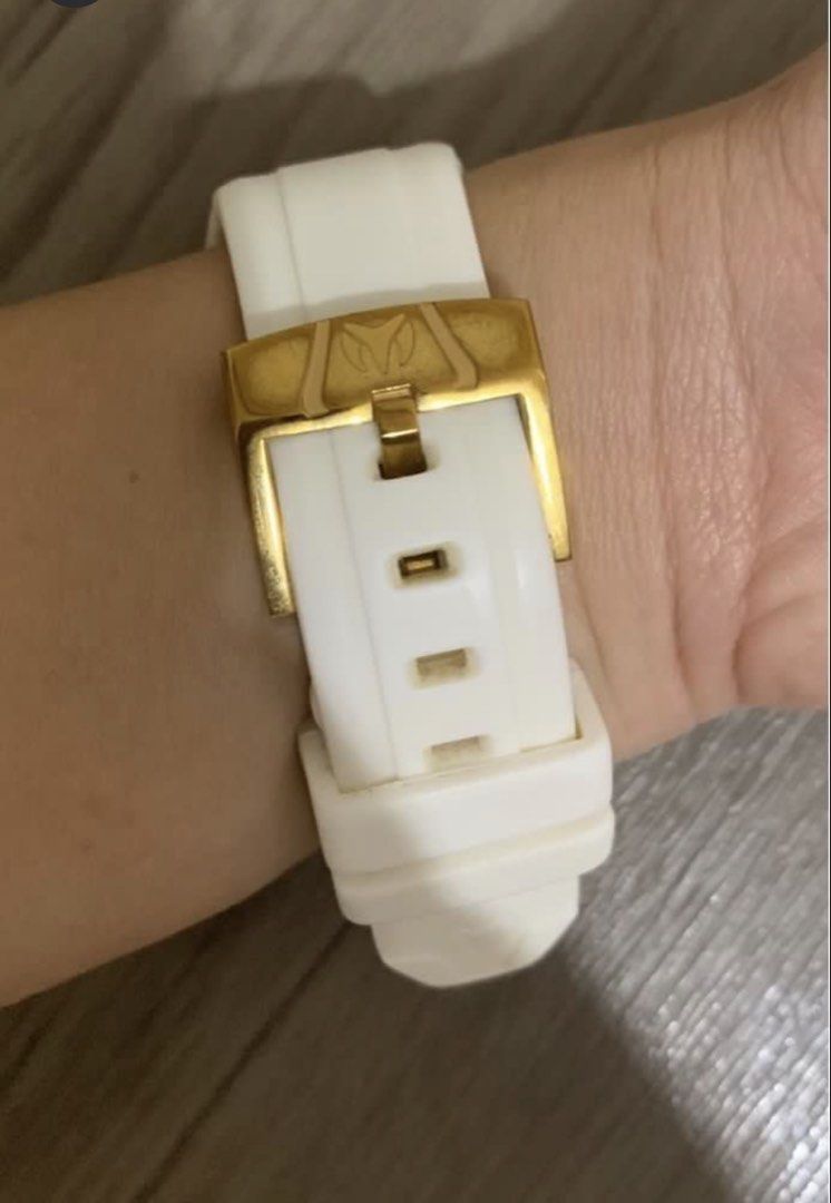 TechnoMarine Chronograph Watch Gold White (Category: Women's Watches) located in Dumaguete. Submitted by freshcornerbyyeng (Listing ID 1469412992, Image 2). Description: - Brand: TechnoMarine - Style: Chronograph, sporty yet dressy everyday timepiece - Case & Buckle: Striking gold-tone with brand logo on the buckle - Dial: Textured white dial with clearly visible subdials and date window - Strap: Comfortable white silicone strap - Water Resistanc