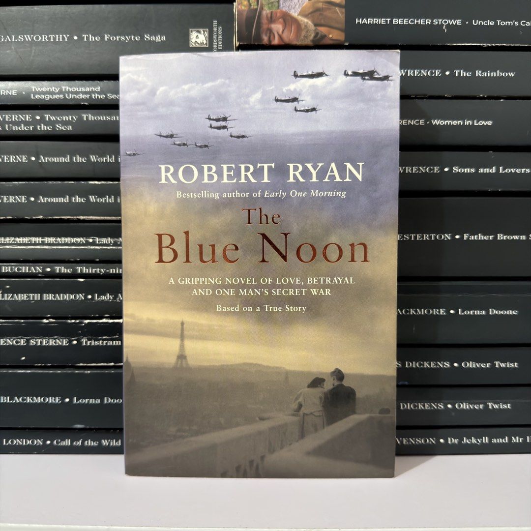 The Blue Noon by Robert Ryan Paperback Novel (Category: Storybooks) located in Lingayen. Submitted by readwjane (Listing ID 1469474338, Image 1). Description: - Title: The Blue Noon by Robert Ryan - Format: Paperback with striking cover art of airplanes and a city - Genre: Historical fiction based on true events - Plot: A gripping story of love, betrayal, and war - Condition: Clean pages and solid spine, great pre-loved condition - Perfect read f
