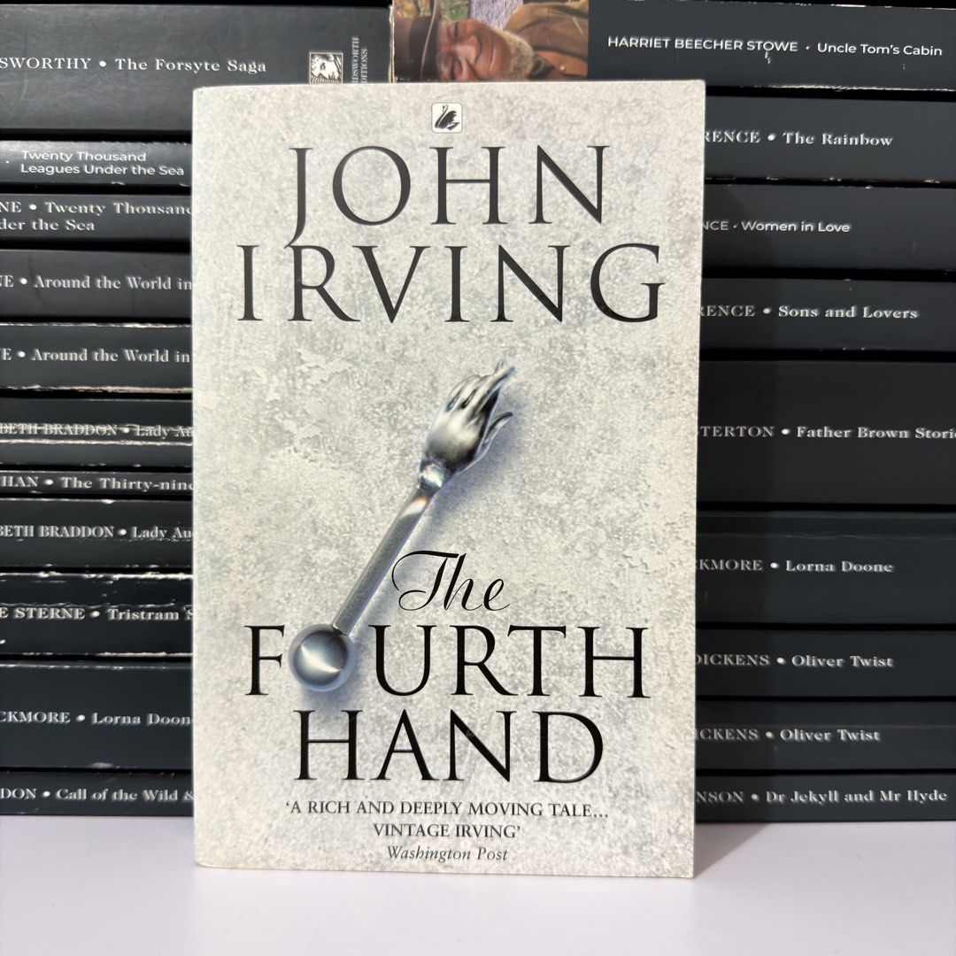 The Fourth Hand by John Irving paperback book (Category: Storybooks) located in Lingayen. Submitted by readwjane (Listing ID 1469477885, Image 1). Description: - Title: The Fourth Hand - Author: John Irving - Publisher: Swan - Format: Paperback - Condition: Clean cover featuring the silver hand design and Washington Post quote - Genre: Contemporary fiction - Perfect for book lovers and Irving fans.