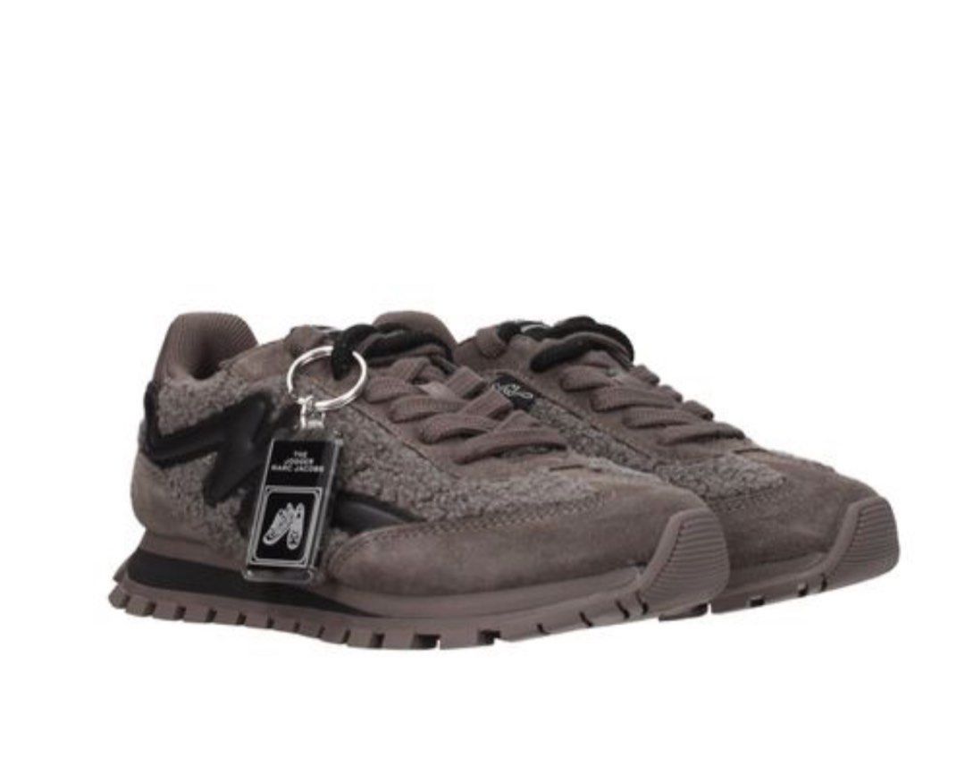 The Jogger Marc Jacobs Teddy Sneakers Size 39 (Category: Sneakers) located in Manila. Submitted by trustedceller (Listing ID 1469476527, Image 1). Description: - Brand: Marc Jacobs (The Jogger) - Color: Dark grey - Size: EU 39/ Size US 8 Runs small, best fit to US 7.5 - Condition: Brand new / Zero wear on soles - Materials: Textured fleece upper with suede and smooth leather overlays - Features: Chunky rubber tread sole with lettering underneath,