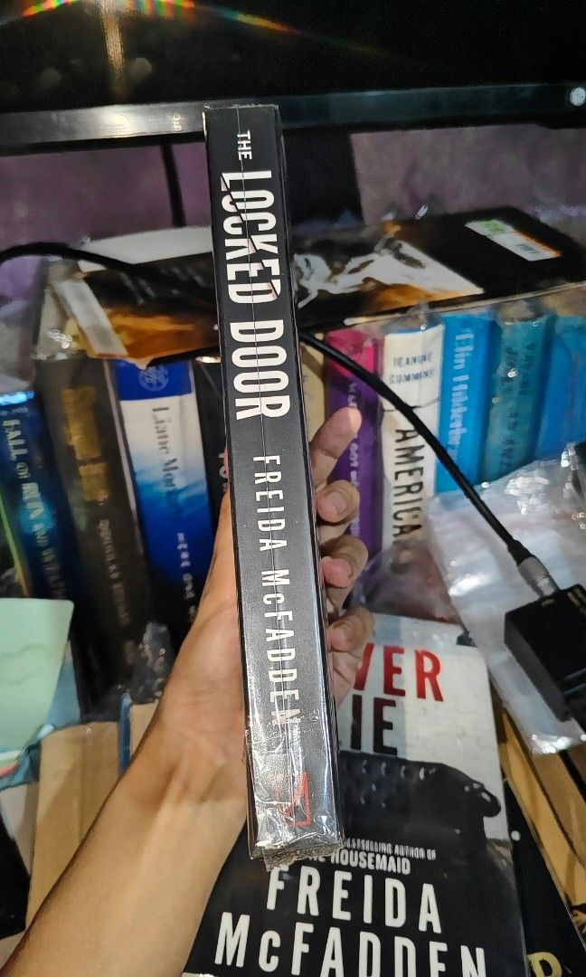 The Locked Door by Freida McFadden (Category: Storybooks) located in Manila. Submitted by soleilmirai (Listing ID 1469521766, Image 2). Description: - High-octane psychological suspense from #1 New York Times bestselling author Freida McFadden (The Housemaid, Never Lie) - Official UK / International trade paperback edition (Poisoned Pen Press / Sourcebooks) * Follows successful surgeon Dr. Nora Davis, who has spent decades hiding that her father 