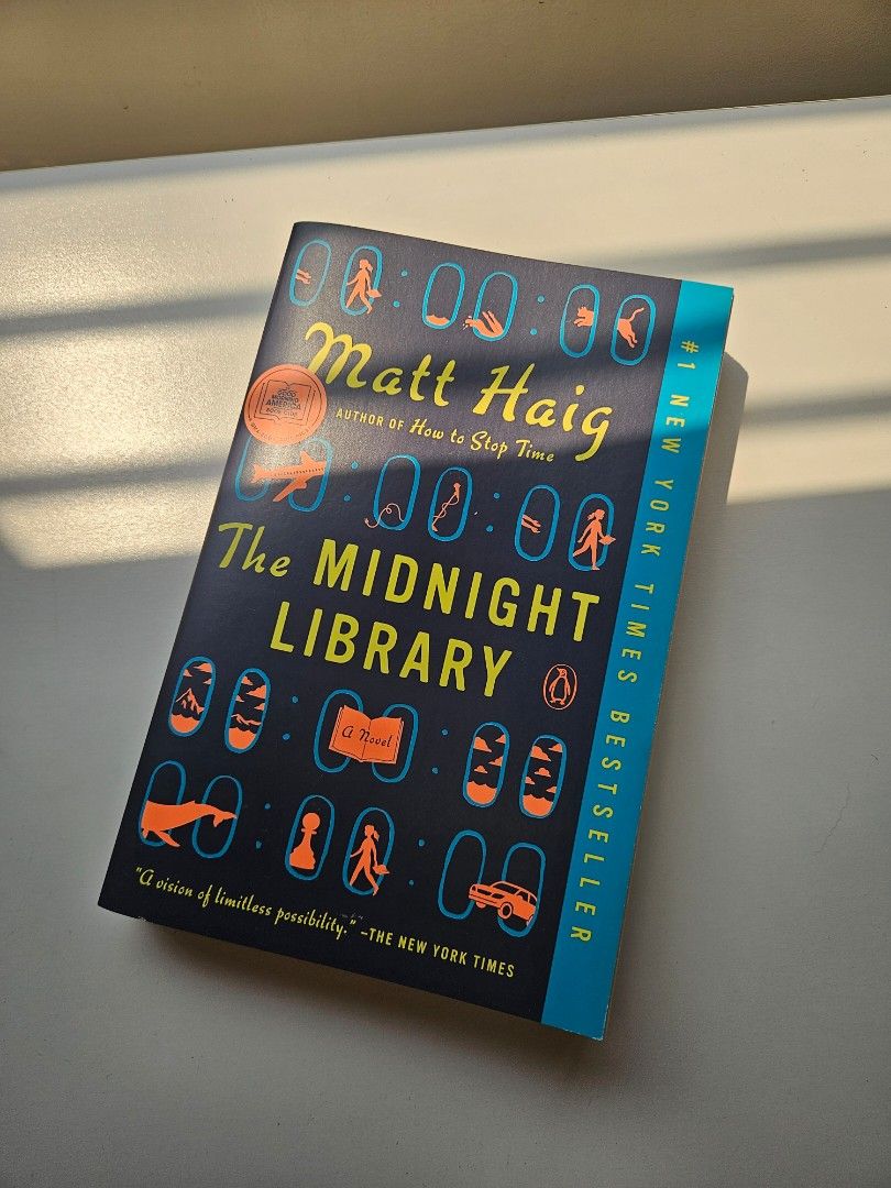 The Midnight Library by Matt Haig Paperback Novel (Category: Storybooks) located in Paranaque City. Submitted by eyagonzales17 (Listing ID 1469418709, Image 1). Description: - Title: The Midnight Library by Matt Haig - Publisher: Penguin Books (Paperback) - Genre: Bestselling fiction about choices, regret, and parallel lives - Condition: Clean covers with crisp spine, minimal creases, light browning of pages - Perfect addition to your reading lis