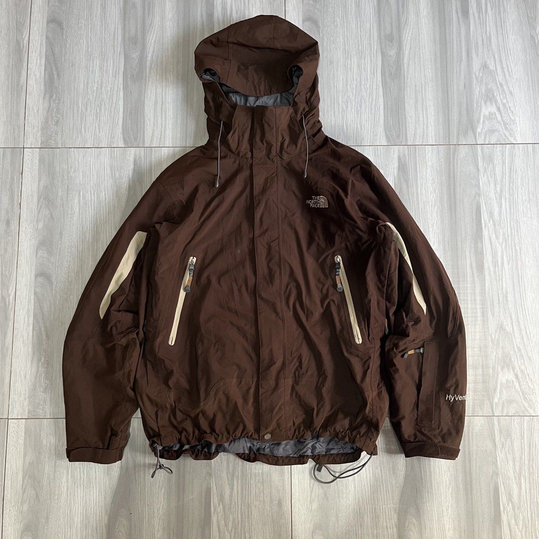 The North Face HyVent in Choco Brown (Category: Coats, Jackets and Outerwear) located in San Jose. Submitted by mellanjose25078 (Listing ID 1469572587, Image 1). Description: ❤️‍🔥Negotiable mga pare❤️‍🔥 - Brand: The North Face - Color: Rich brown with contrasting cream sleeve panels - Technology: HyVent waterproof tech for unpredictable weather - Features: Zip-front closure, secure zippered pockets - Fit: Adjustable hood and hem with drawstring