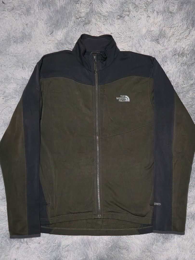 The North Face Olive Green Jacket (Category: Coats, Jackets and Outerwear) located in Abulug. Submitted by humanwhosellthings (Listing ID 1469404731, Image 1). Description: Size XL 23W x 28L Excellent Condition No issue.