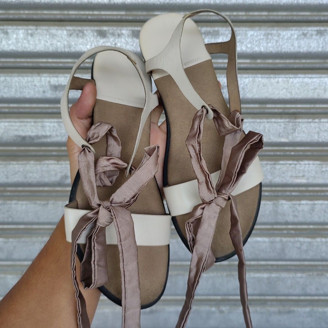 ANKLE STRAP SANDALS 'THE SUREN COMPANY' (Category: Flats & Sandals) located in Barotac Nuevo. Submitted by yorcollections (Listing ID 1469474656, Image 2). Description: THE SUREN COMPANY ANKLE STRAP SANDALS, soft wrap-around ribbon ankle ties Best fit size 38.
