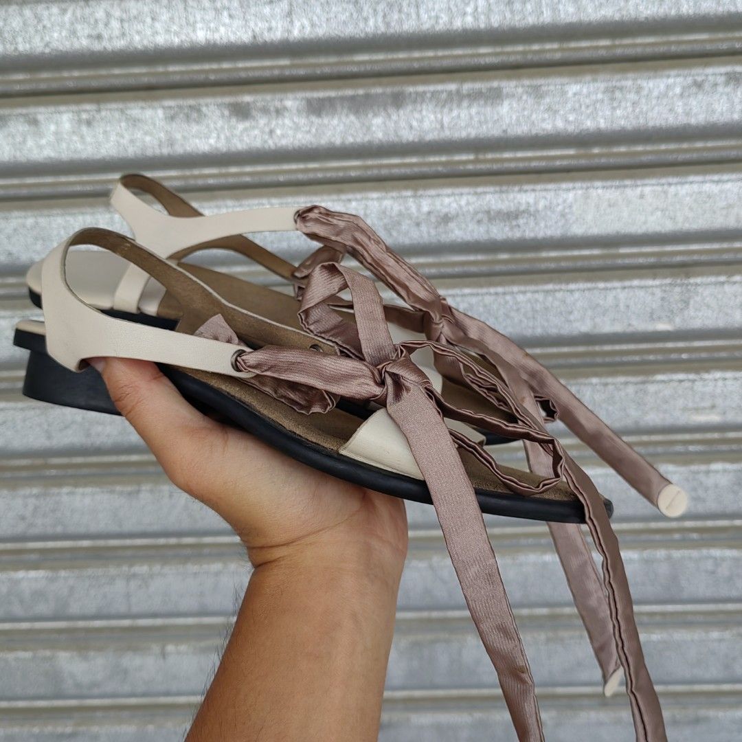 ANKLE STRAP SANDALS 'THE SUREN COMPANY' (Category: Flats & Sandals) located in Barotac Nuevo. Submitted by yorcollections (Listing ID 1469474656, Image 3). Description: THE SUREN COMPANY ANKLE STRAP SANDALS, soft wrap-around ribbon ankle ties Best fit size 38.