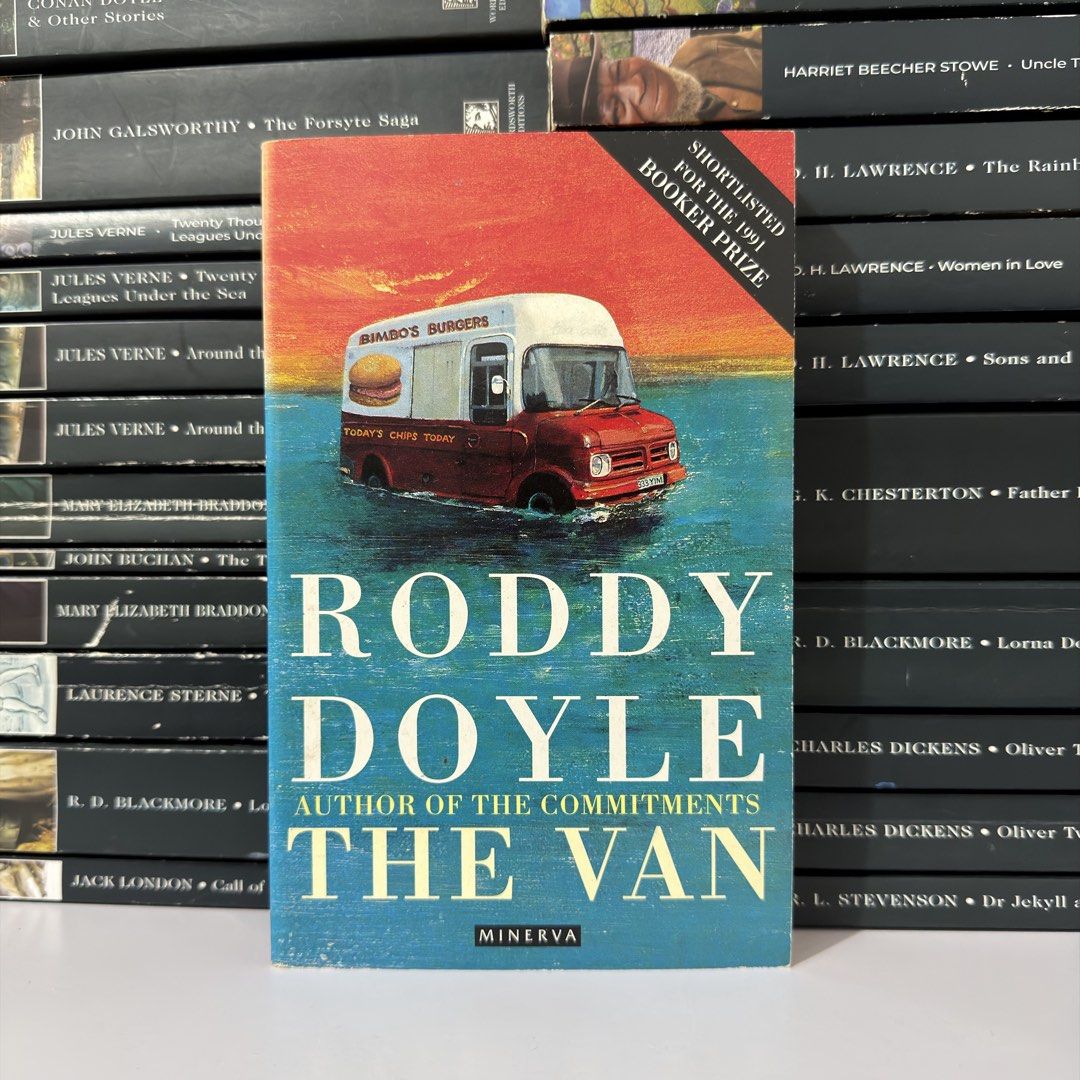 The Van by Roddy Doyle Minerva Edition Paperback (Category: Storybooks) located in Lingayen. Submitted by readwjane (Listing ID 1469478143, Image 1). Description: - Title: The Van by Roddy Doyle - Publisher: Minerva (Paperback) - Accolades: Booker Prize Shortlisted Novel - Condition: Normal shelf wear on edges and corners; clean pages inside - Highlights: Great fiction read from the author of The Commitments with an iconic food truck cover.