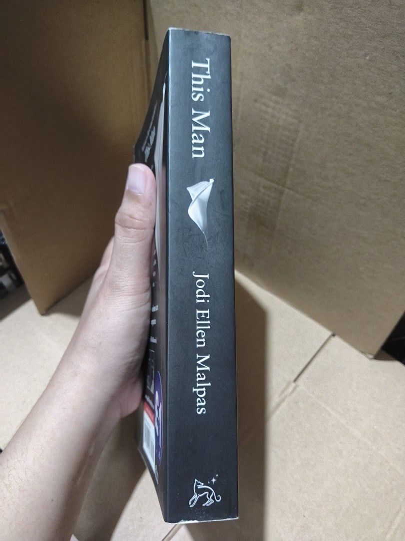 THIS MAN - JODI ELLEN MALPAS (Category: Storybooks) located in Taguig. Submitted by booksbynini (Listing ID 1469560381, Image 2). Description: ⚠️ Please manage your expectations — this is a pre‑loved copy Flaws: Foxing on inner pages, cover creases, minor marks on the rainbow‑colored page edges; fully readable..
