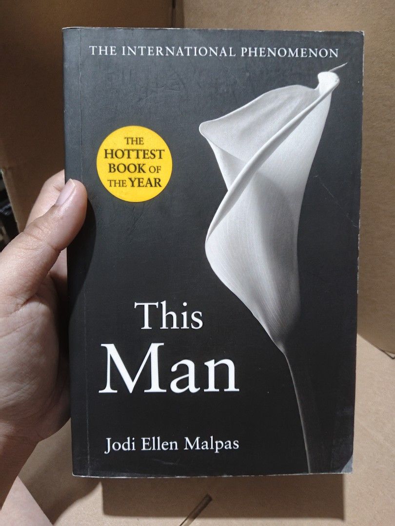 THIS MAN - JODI ELLEN MALPAS (Category: Storybooks) located in Taguig. Submitted by booksbynini (Listing ID 1469560381, Image 1). Description: ⚠️ Please manage your expectations — this is a pre‑loved copy Flaws: Foxing on inner pages, cover creases, minor marks on the rainbow‑colored page edges; fully readable..