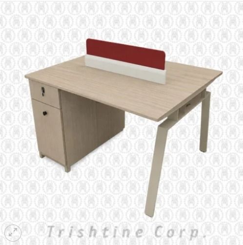 TOFF-158 | 2 Seater modern workstation (Category: Office Furniture & Fixtures) located in Caloocan City. Submitted by jim.trishtineofficefurnitures (Listing ID 1469473363, Image 1). Description: - Type: Double workstation desk setup - Finish: Light wood with white and red central privacy divider - Storage: Built-in side cabinet with a locking top drawer and lower compartment - Structure: Sturdy angled metal legs supporting the open side - Ideal f