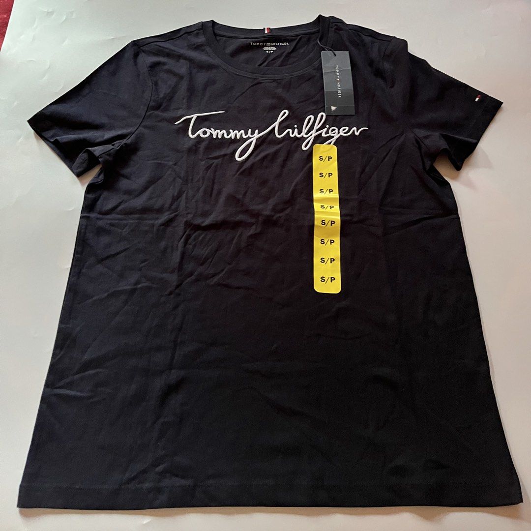 Tommy Hilfiger T-Shirts (Category: Shirts) located in Santa Rosa. Submitted by ninaparis (Listing ID 1469450602, Image 3). Description: Original Tommy Hilfiger Crewneck T-Shirt size Small with cursive embroidered Logo in black .