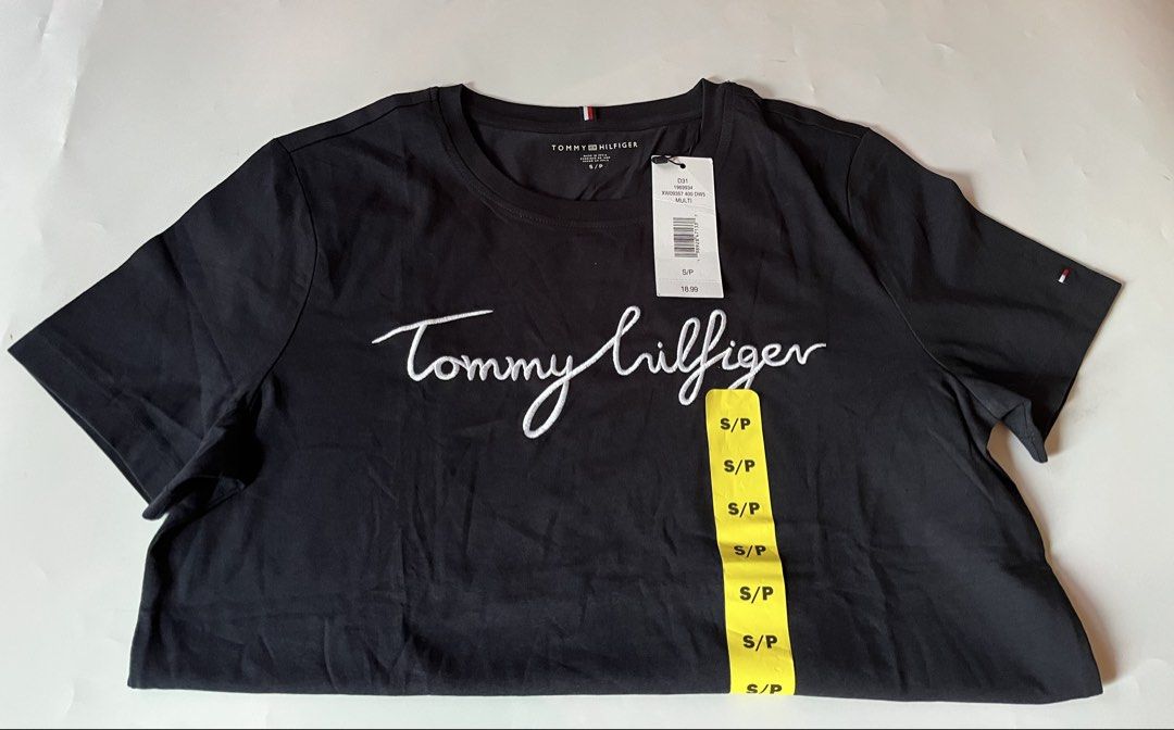 Tommy Hilfiger T-Shirts (Category: Shirts) located in Santa Rosa. Submitted by ninaparis (Listing ID 1469450602, Image 2). Description: Original Tommy Hilfiger Crewneck T-Shirt size Small with cursive embroidered Logo in black .