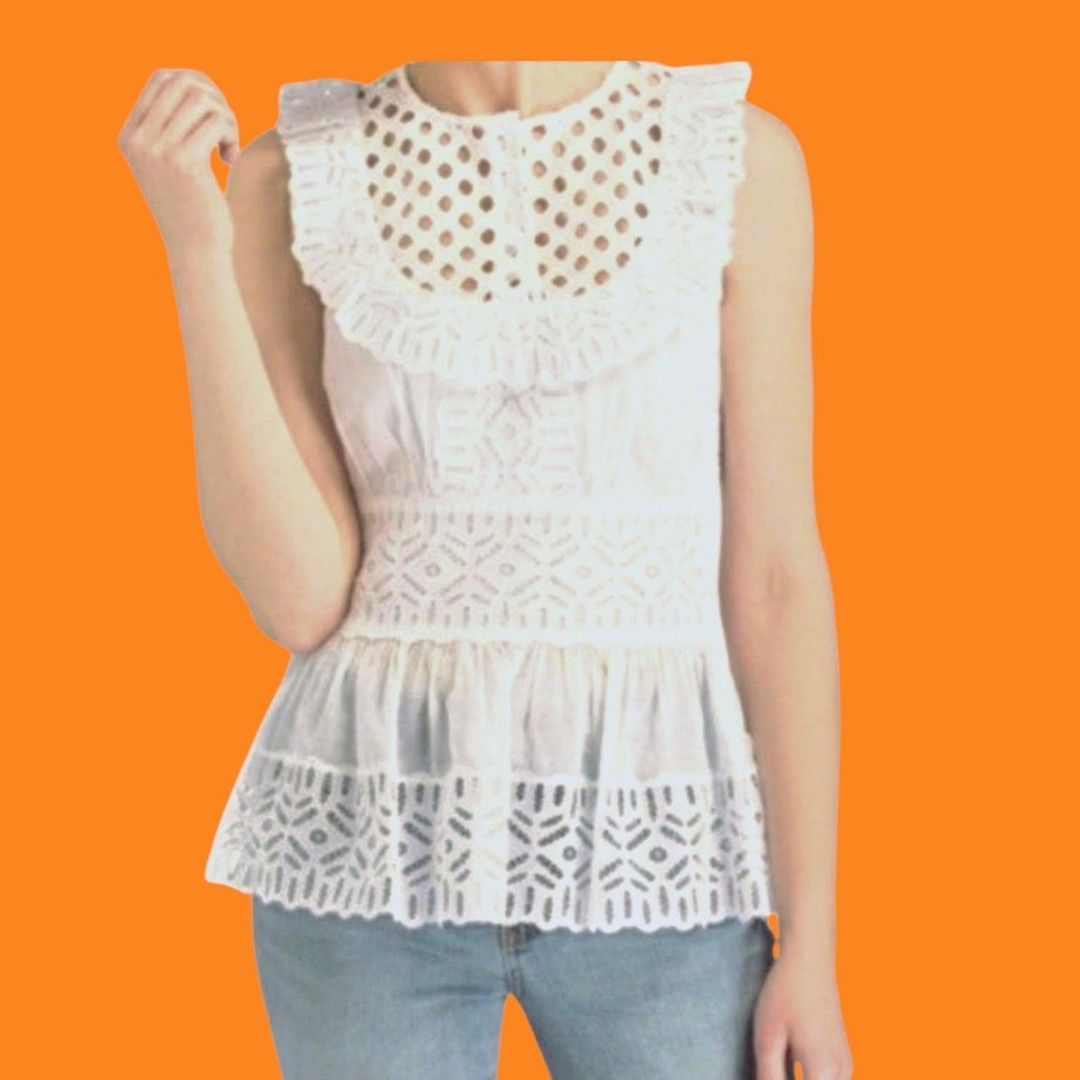 Tory Burch Off White Hermosa Top Size 10 (Category: Blouses) located in Paranaque City. Submitted by calm_youngstore7 (Listing ID 1469463995, Image 1). Description: -LAST PIECE SAKE ! 80% OFF RETAIL! Brand: Tory Burch - Style: Hermosa Top - Color: Off-White - Size: 10 - Condition: Brand new with original tags attached - Retail Price: €180 - Details: Eyelet lace yoke, ruffle collar, sleeveless, flared peplum hem with cutout details - Ideal for: Su
