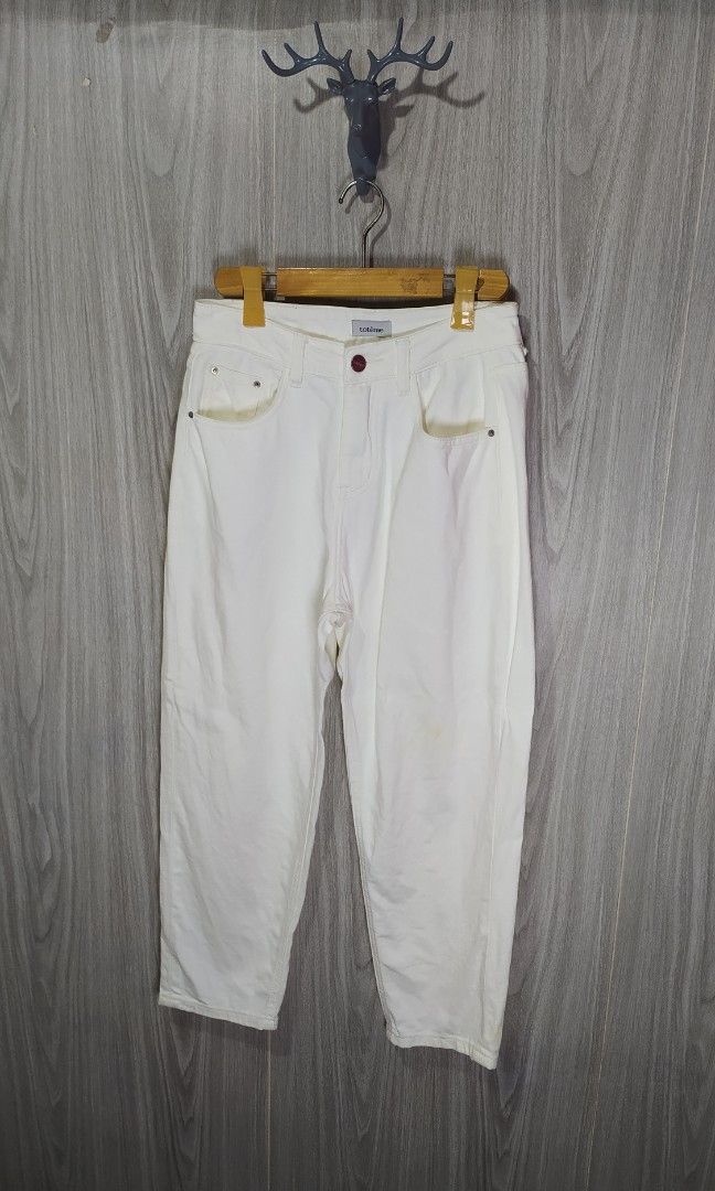 Toteme Pants (Category: Jeans) located in Naga. Submitted by secondspinv2 (Listing ID 1469560183, Image 1). Description: Toteme Jeans ✅Size: 27 ✅Length: 35.5 ✅Hem: 6.5 ✅Color Rate: 9/10 ✅Issue: Yellow Stain ✅Need Wash ✅Location: Bicol Naga City, Camarines Sur ✅Courier: J&T Express/Flash Express ✅MOP: Gcash only.