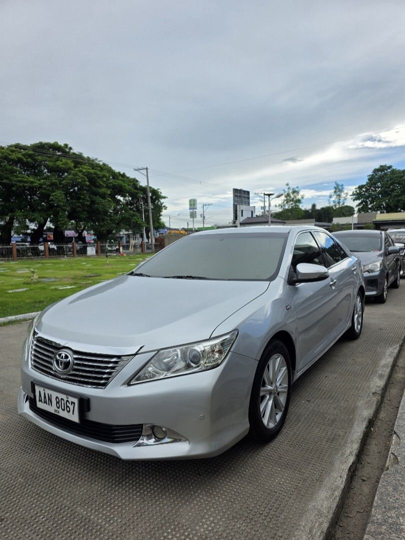 Toyota Camry 2.5 (A) (Category: Used Cars) located in San Fernando. Submitted by luckydog.0d4b76 (Listing ID 1465331855, Image 2). Description: 2014 Toyota Camry 2.5 V Top of the line Fresh, very well maintained Original paint Excellent engine condition Solid underchassis Smooth shifting Cold aircon Intact interior Original 106k mileage Intact original leather seats Power seats front & back Power sunshade Rear windows sunshade Front and rear park