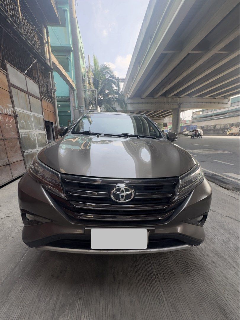 Toyota Rush 1.5 X (A) (Category: Used Cars) located in Manila. Submitted by dimsum_mimsum (Listing ID 1469499234, Image 1). Description: FOR SALE: 2019 TOYOTA RUSH G AT VEHICLE DETAILS Make & Model: Toyota Rush G Year Model: 2019 Transmission: Automatic Color: Dark Brown Odometer Reading: 49,000km Fuel Type: Gasoline Body Type: SUV Conditon: 8/10 (Minor Scratches) Plate Number: Ending 2 - Monday Coding 💰 Selling Price: ₱650,000 negotiable 📍 Loc