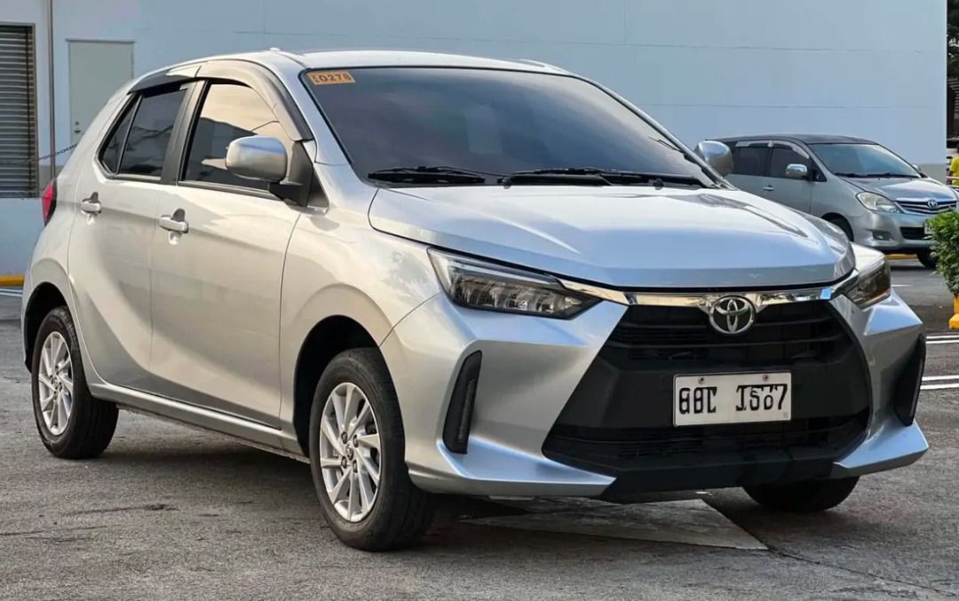 Toyota WIGO 1.0 E CVT Auto (Category: Used Cars) located in Caloocan City. Submitted by keenfalcon.cc3a1c (Listing ID 1467675439, Image 2). Description: 🔥 FOR SALE | 2025 TOYOTA WIGO 1.0 E A/T 🔥 FRESH • LOW MILEAGE • ALL STOCK 📌 UNIT DETAILS • 21K mileage only • All stock • Clean & well-maintained • Updated registration ⚙️ SPECS • 1.0L 3-Cylinder Gasoline Engine • CVT Automatic Transmission • Front-Wheel Drive • 5-Seater • Power Windows • Powe