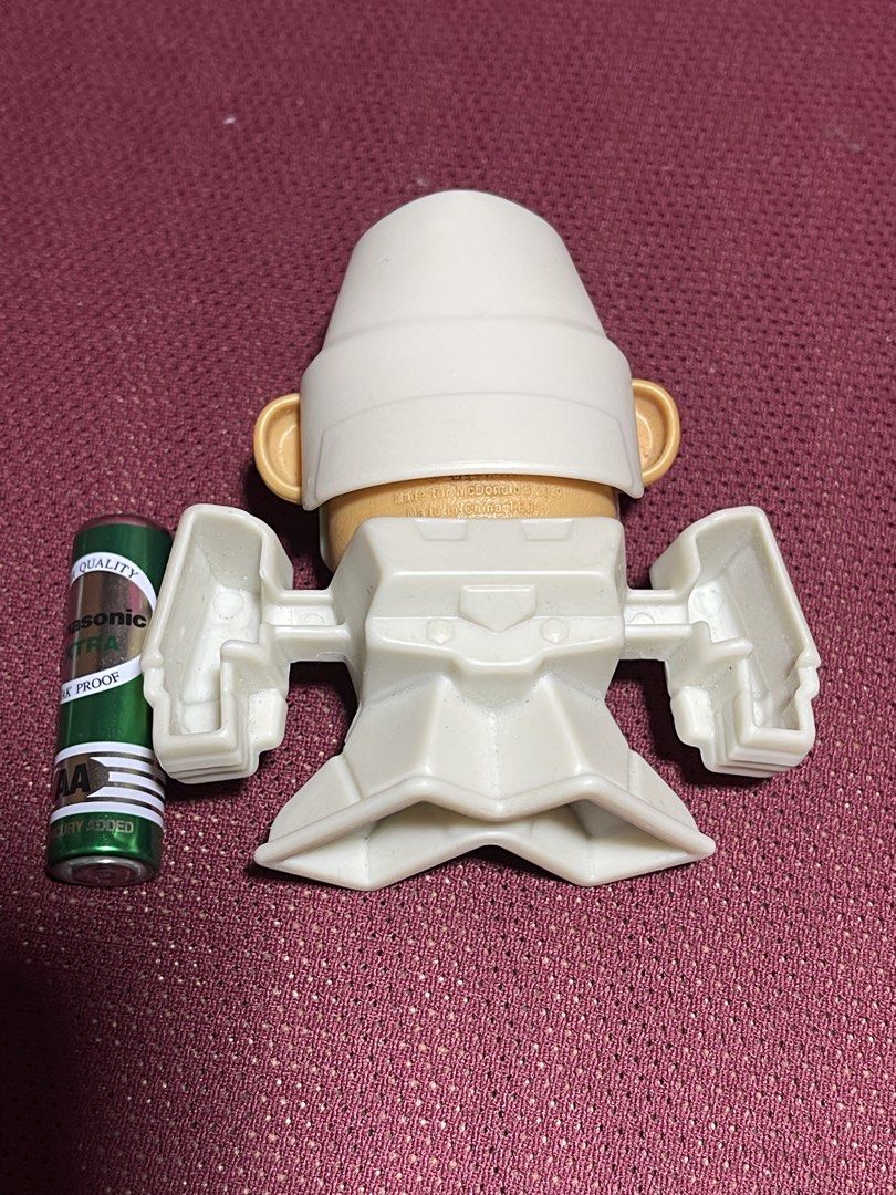 Transformers Mr. Potato Head Megatron McDonald's Toy (Category: Figurines & Statues) located in Manila. Submitted by dstrangerthings (Listing ID 1469543744, Image 3). Description: - Item: McDonald's Transformers Mr. Potato Head - Megatron - Release Year: 2022 by Hasbro - Size: Slightly taller than a standard AA battery - Features: Detachable helmet, body, and potato piece for easy disassembling - Condition: Great, fun mashup collectible for fans.