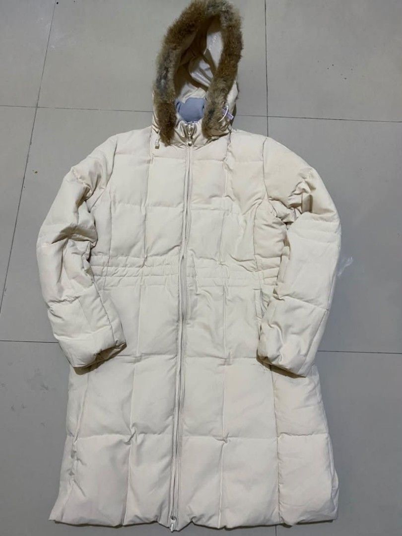 Traveler Puffer Jacket (Category: Coats, Jackets and Outerwear) located in Cainta. Submitted by ohhhhhhlori (Listing ID 1469525827, Image 1). Description: Traveler Cream Off White Long Puffer Jacket Winter Coat Size M Selling this cozy and stylish long puffer coat from Traveler. Perfect for upcoming winter trips, holidays, or cold weather! Key Features: * Brand: Traveler * Size: M (Medium) * Color: Cream / Off-White * Design: Long-line style for 