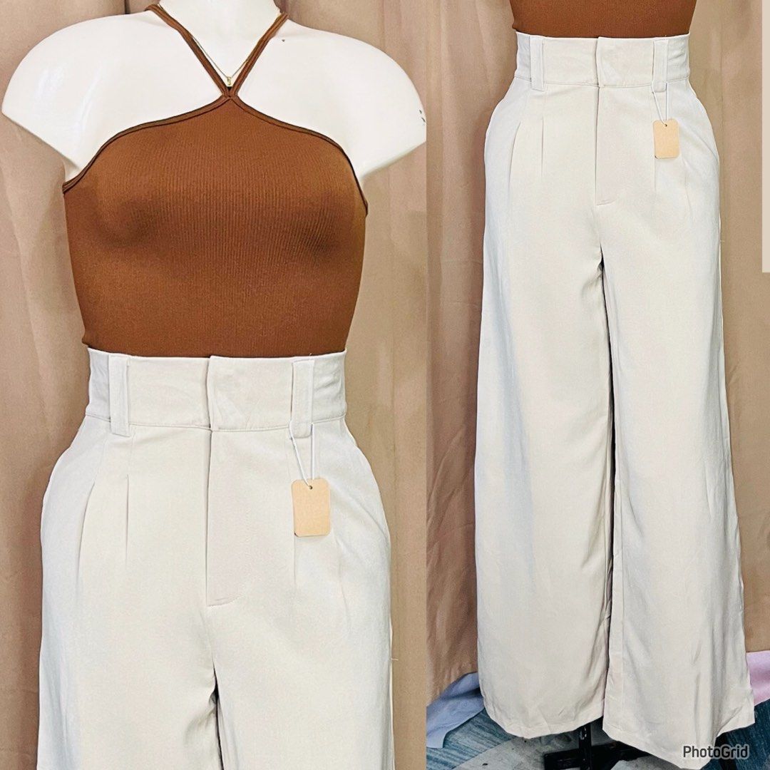 Trousers Pants | Size 26-27 (Category: Other Bottoms) located in Manila. Submitted by bengirlclothing (Listing ID 1469485552, Image 2). Description: - Color: Beige - Style: High waist, wide leg - Details: Pleated front, thick waistband with belt loops - Look: Clean, minimal, and versatile for casual or dressed-up outfits.