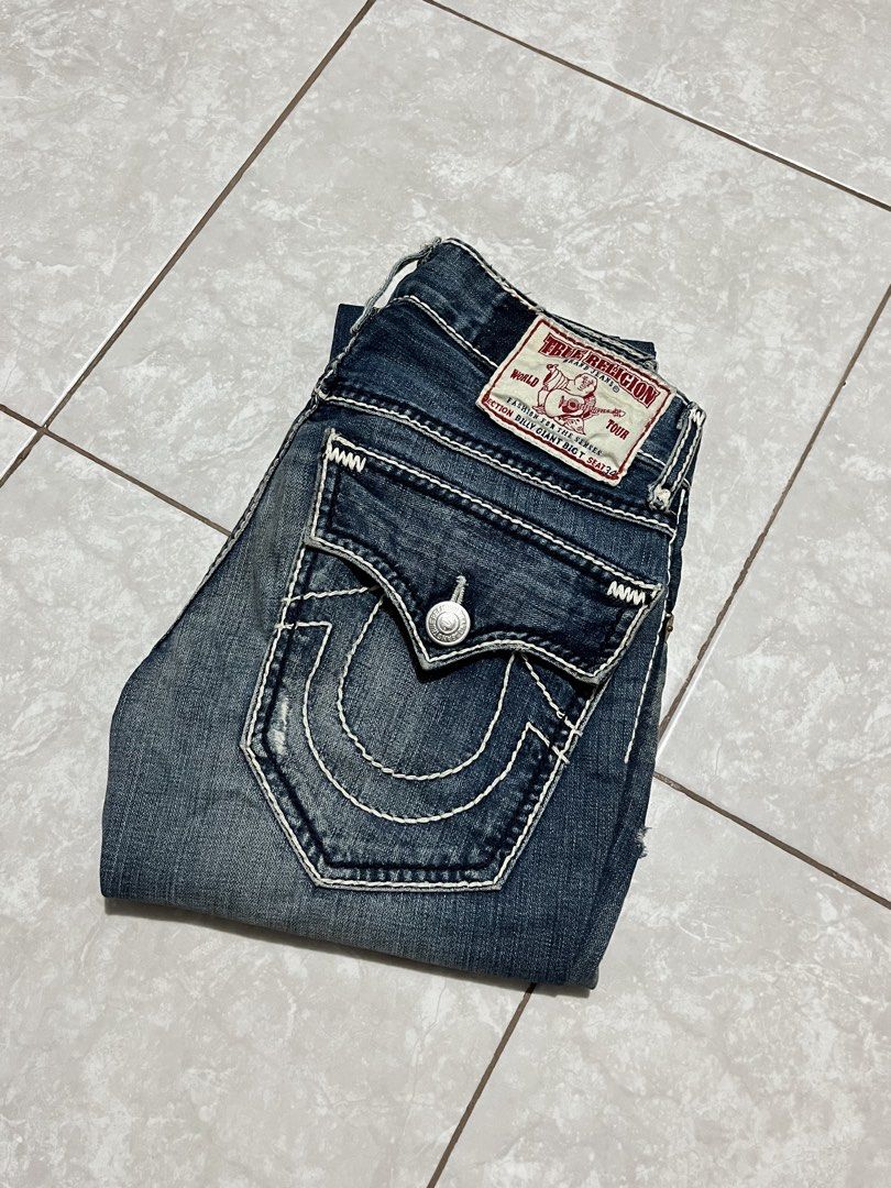 True Religion Billy Giant Big T Jeans (Category: Jeans) located in Manila. Submitted by nycts (Listing ID 1469459018, Image 1). Description: True Religion Billy Giant Big T Jeans Waist 28 Length 41 Hem 7.5 Lightly used — with signs of repair Product color may slightly vary due to photographic lighting‼️ Courier: J&T Mode of payment: Gcash / PayMaya / Gotyme Direct message if interested 📩.