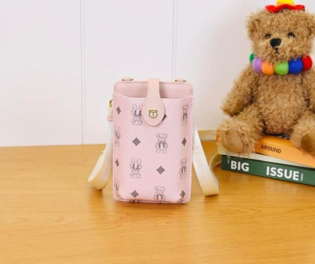 TTWN Bear CP Bag from Bangkok (Category: Cross-body Bags) located in Marikina City. Submitted by savemyclosetph (Listing ID 1469497712, Image 1). Description: TTWN Bear Cellphone Bag from Bangkok Brandnew Pink P1099.00.