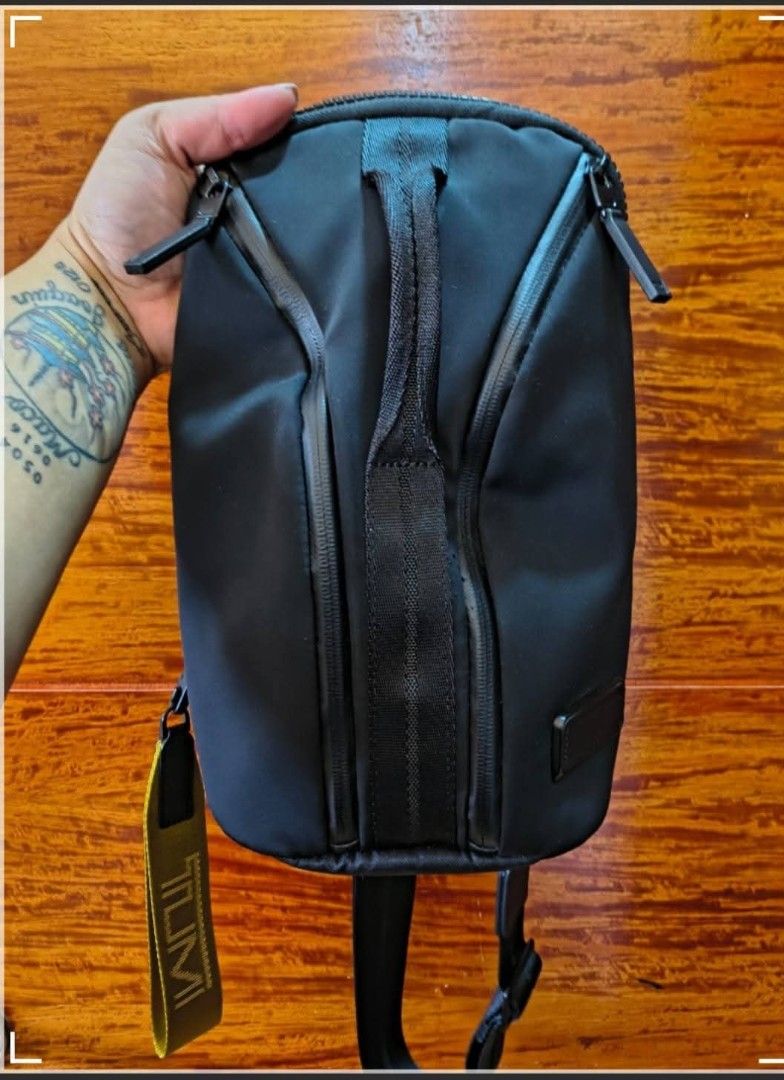 TUMI ORIGINAL MONEY BACK (Category: Belt bags, Clutches and Pouches) located in Binan City. Submitted by chloedvoutletshoppe (Listing ID 1469461450, Image 1). Description: ✔️ All items are 100% authentic ✔️ Money-back guarantee for authenticity 💳 Mode of Payment (MOP): • GCash • Bank Transfer 📦 Shipping Fee (SF): • Via LBC / Lalamove • Shouldered by buyer 🚫 All sales are final • No return, no exchange • Exceptions apply only for items with pro