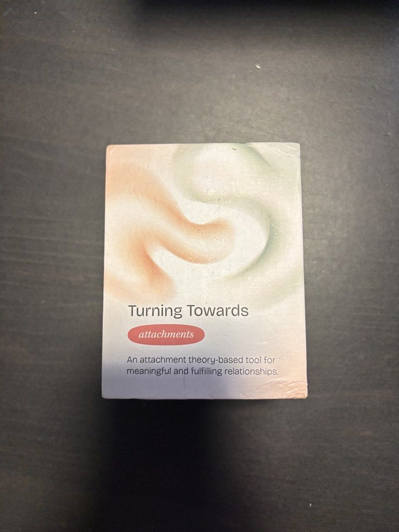 Turning Towards Attachments Card Game (Category: Board Games & Puzzles) located in Manila. Submitted by mganovelo64040 (Listing ID 1469477226, Image 1). Description: Turning Towards Attachments card game by ASN Wellness. Features 199 prompts based on attachment theory for anxious, avoidant, and secure patterns. Categories cover reflection, connection, rupture, and repair..