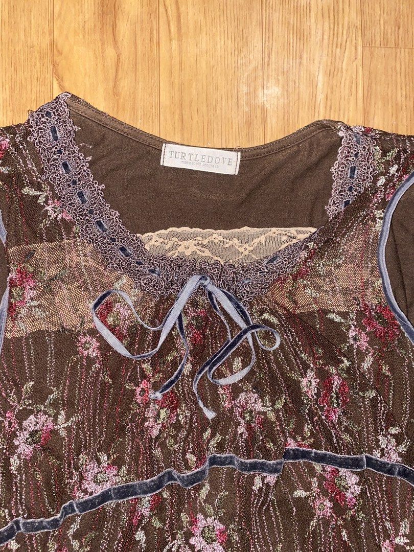 Turtle down floral laced top (Category: Sleeveless) located in General Trias. Submitted by swagster.archives (Listing ID 1469535633, Image 3). Description: Turtle down top W-15.5 inches L- 23 inches No Major Flaw ₱350.