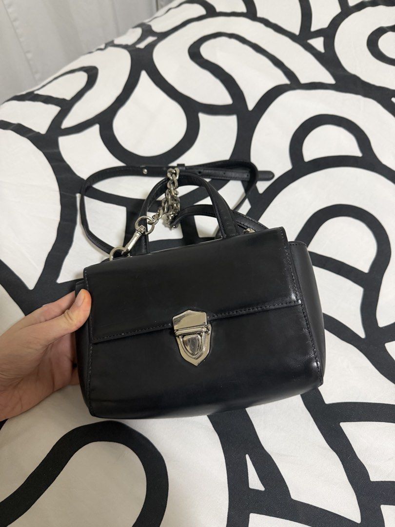 Two Toned Sling Bag (Category: Cross-body Bags) located in Caloocan City. Submitted by christineproject.ph (Listing ID 1469557299, Image 1). Description: Small size. Could only fit small phone and slim card holder. Perfect for casual occasions .