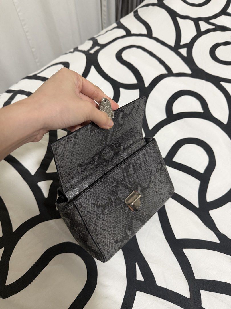 Two Toned Sling Bag (Category: Cross-body Bags) located in Caloocan City. Submitted by christineproject.ph (Listing ID 1469557299, Image 3). Description: Small size. Could only fit small phone and slim card holder. Perfect for casual occasions .
