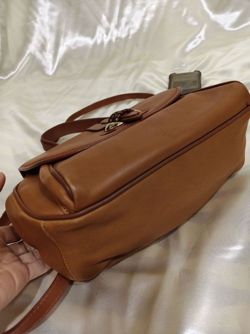 TWO WAY GENUINE LEATHER SLING 10/9" (Category: Cross-body Bags) located in Gamu. Submitted by 2022bagsbunny (Listing ID 1469401592, Image 2). Description: .