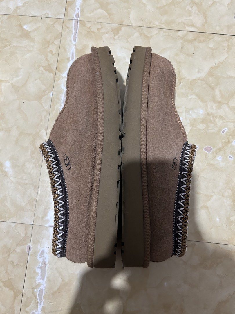 Uggs Tasman Slip On (Category: Slippers and slides) located in Paranaque City. Submitted by lovelyzshoppp (Listing ID 1469480275, Image 3). Description: - ORIGINAL! Bought from the 🇺🇸 - rfs: not really using them anymore - will need cleaning but overall condition is good! - size 6 - MOP: PayMaya - MOD: Same Day Delivery Only.