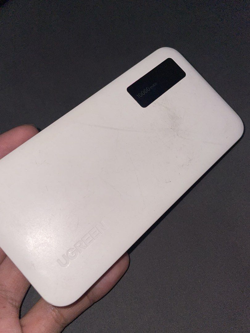 UGREEN 10,000mAh Powerbank (Category: Batteries & Power Banks) located in Manila. Submitted by zade__ (Listing ID 1469478916, Image 1). Description: Original price: 1,099 Minsan lang magamit Only issue as you can see in the pictures is the scratches .