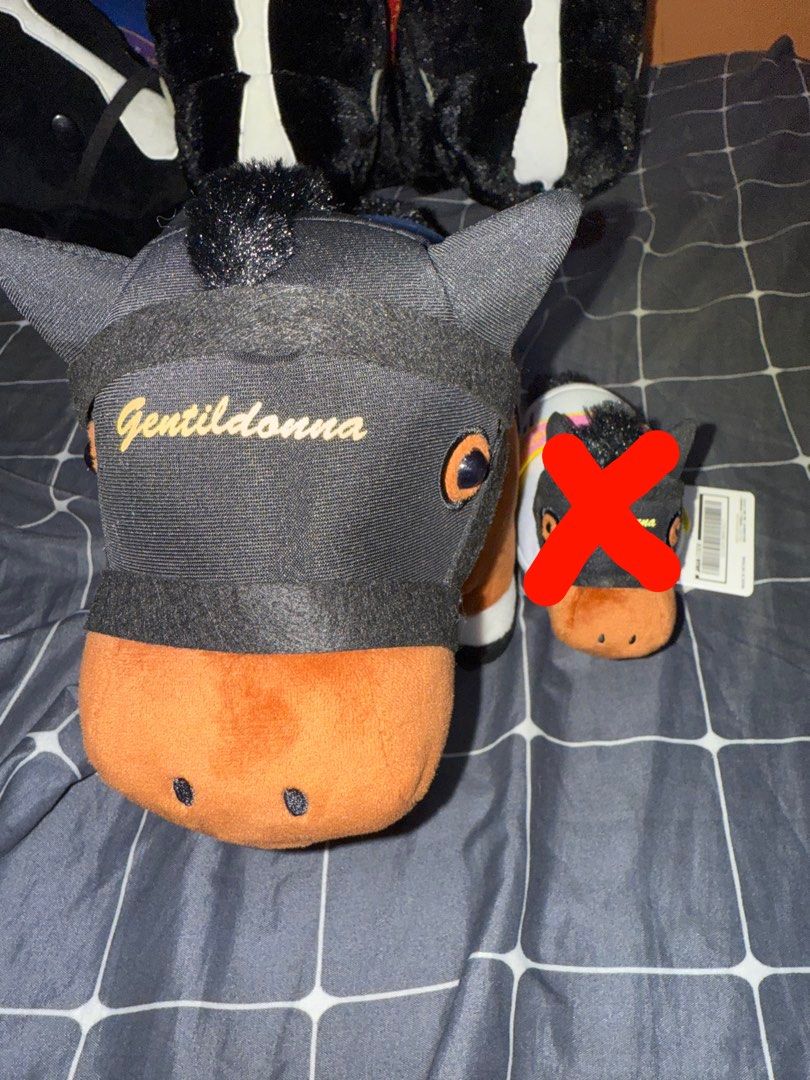 Uma Gentildonna Thoroughbred Horse Plush Toy (Category: Plushies & Soft Toys) located in Ozamiz City. Submitted by clickerx (Listing ID 1466461024, Image 2). Description: - Large plush features number 15 blue saddle pad - Mini keychain wears a white racing outfit - Ideal collectible set for horse racing and anime fans.