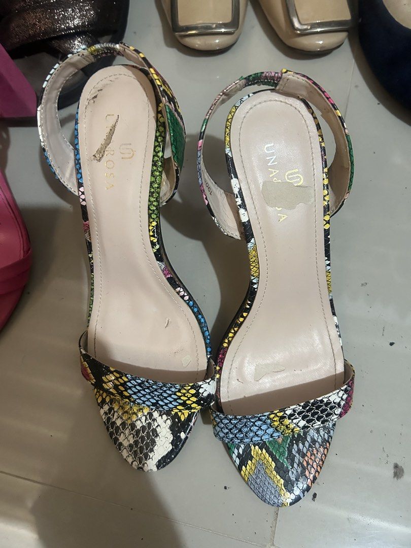 Una Rosa (Category: Heels) located in Cavite. Submitted by cecitrifthshop (Listing ID 1469421082, Image 1). Description: Multi colored snake print high heeled ankle strap sandals from UNA Rosa brand size .